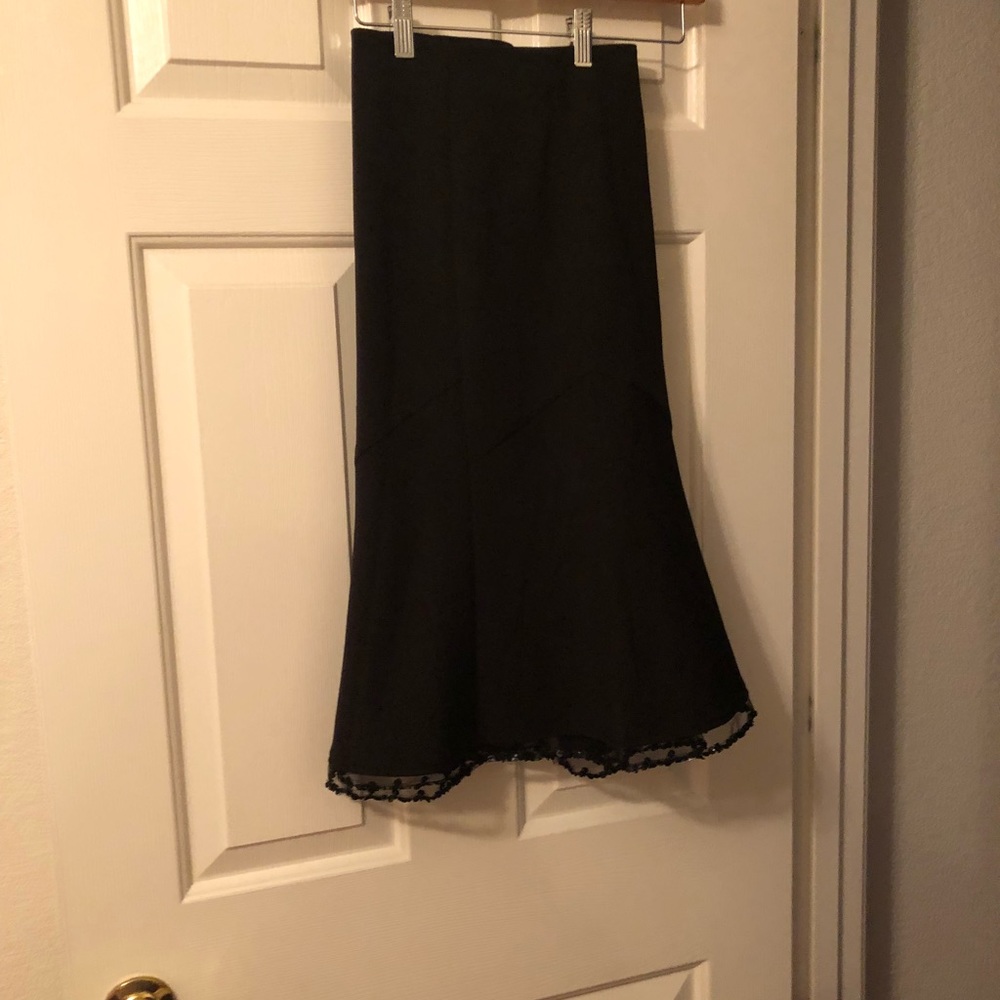 Lane Bryant black skirt with sequin hem. 28 w.